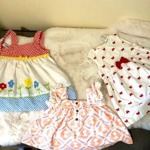 Three beautiful baby dresses 3- 12 months